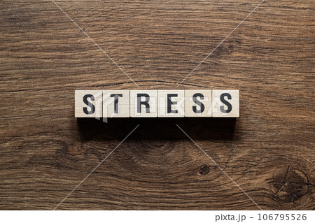 Stress - word concept on building blocks, text 106795526