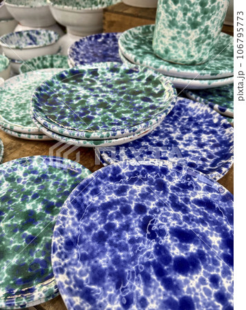 ceramic or clay plates and bowls 106795773