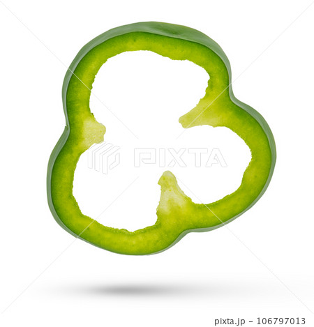 Green paprika cloves on a white isolated background close-up. Paprika of different sizes fall, casting a shadow, for insertion into a design or project Green paprika cloves on a white isolated background close-up. Paprika of different sizes fall, casting a shadow, for insertion into a design or project 106797013