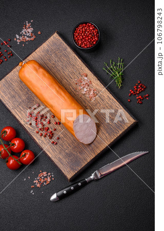 Delicious smoked chicken sausage with salt, spices and herbs Delicious smoked chicken sausage with salt, spices and herbs 106798243