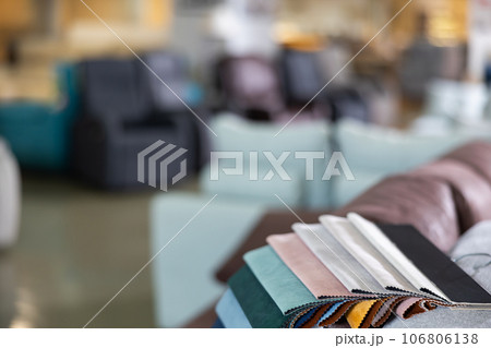 Upholstery material swatch on display in furniture showroom 106806138