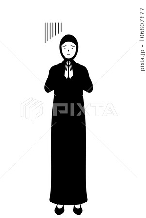 体の前で手を合わせて謝るイスラムの女性 106807877