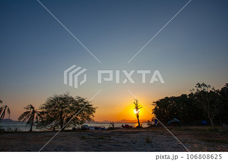 beautiful golden sunset above the ocean. beautiful golden sunset above the ocean. 106808625