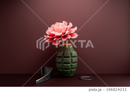 The flower in the disassembled hand grenade - anti-war concept 106824211