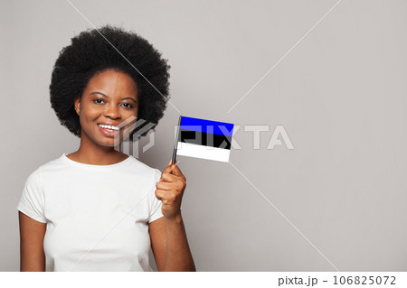 Estonian woman holding flag of Estonia Education, business, citizenship and patriotism concept 106825072