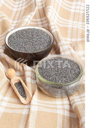 Poppy Seed, Blue Poppyseed Pile, Small Culinary Grains, Tiny Seeds, Oilseed Sprinkles Poppy Seed, Blue Poppyseed Pile, Small Culinary Grains, Tiny Seeds, Oilseed Sprinkles 106825522