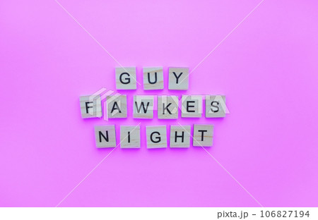 November 5, Guy Fawkes Night, minimalistic banner with the inscription in wooden letters on a lilac background November 5, Guy Fawkes Night, minimalistic banner with the inscription in wooden letters on a lilac background 106827194