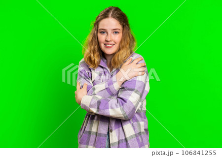 Young woman spread hands and give hug to you, pleasant expression, love feelings, proud, satisfied 106841255
