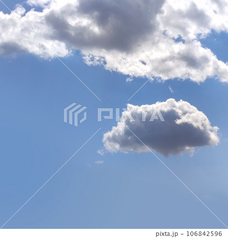 White clouds isolated over blue sky background 106842596