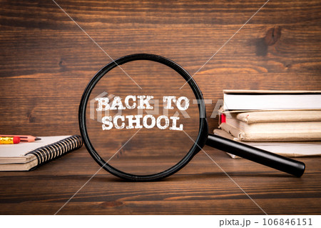 Back To School Concept. Textbooks on a wooden texture table Back To School Concept. Textbooks on a wooden texture table 106846151