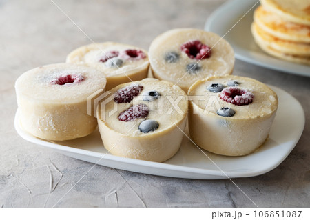 Frozen batter for pancakes are homemade preparation or trendy ice cube pancakes 106851087