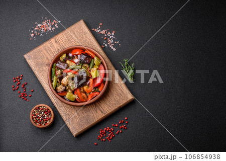 Delicious fresh salad of grilled vegetables peppers, tomatoes, eggplants and zucchini Delicious fresh salad of grilled vegetables peppers, tomatoes, eggplants and zucchini 106854938