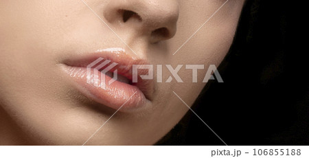 Beauty fashion woman lips with natural beige color makeup. Matt lipstick. Nude colors. Beauty fashion woman lips with natural beige color makeup. Matt lipstick. Nude colors. 106855188