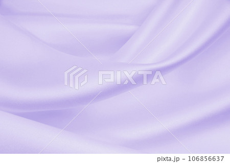 Smooth elegant lilac silk or satin texture as wedding background. Luxurious background design Smooth elegant lilac silk or satin texture as wedding background. Luxurious background design 106856637