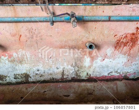 Closeup of the old faucet on the sink row. 106857801