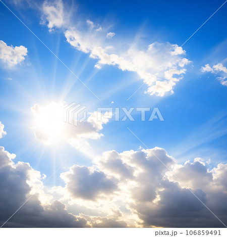Blue sky background with tiny clouds and sun rays 106859491