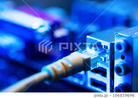 USB connection cable and accessories port of the office working PC desktop. Computer and technology object photo. Close-up and selective focus 106859696
