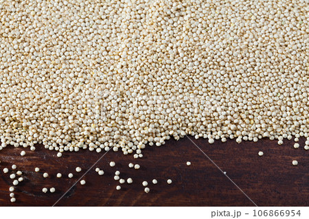 Quinoa on wooden background Quinoa on wooden background 106866954