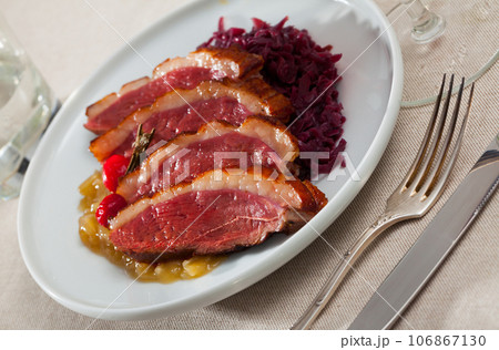 Duck breast Magret with stewed cabbage Duck breast Magret with stewed cabbage 106867130