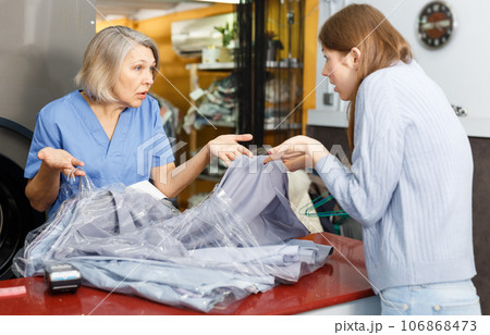 Woman dissatisfied with quality of work 106868473