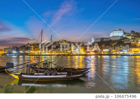 Porto Portugal, city skyline at Porto Ribeira and Douro River with Rabelo wine boat Porto Portugal, city skyline at Porto Ribeira and Douro River with Rabelo wine boat 106875496