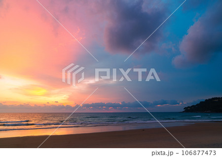 amazing pink sky above Karon beach Phuket at colorful sunset. sweet sky in colorful sunset above the ocean. Imagine a fantasy bright pink in blue sky at sunset. Sky texture background. 106877473