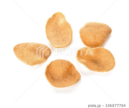 Shrimp rice crackers in thai food isolated on white background, cornflakes, crisp rice,Thai snack. Shrimp rice crackers in thai food isolated on white background, cornflakes, crisp rice,Thai snack. 106877784
