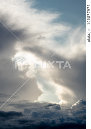 Dramatic sky with grey clouds over the city before the storm. Weather before or after a storm. 106877975