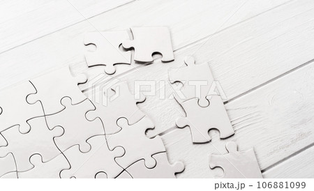 Unfinished jigsaw puzzle 106881099