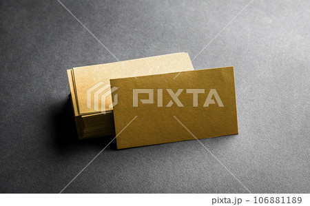 Blank golden business card on grey background Blank golden business card on grey background 106881189