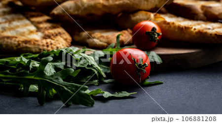 Cherry tomatoes with toasts 106881208