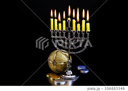 Hanukkah flames kindling hanukkiah menorah candles during jewish holy holiday 106883346