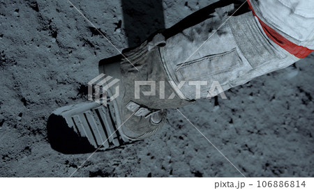 3D rendering. Lunar astronaut walking on the moon's surface and leaves a footprint in the lunar soil. CG Animation. Elements of this image furnished by NASA. 3d rendering. 3D rendering. Lunar astronaut walking on the moon's surface and leaves a footprint in the lunar soil. CG Animation. Elements of this image furnished by NASA. 3d rendering. 106886814