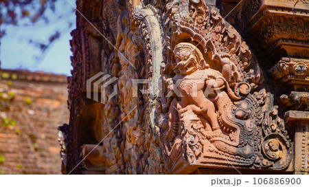 Mysterious Ancient ruins Banteay Srei temple - famous Cambodian landmark, Angkor Wat complex of temples. Siem Reap, Cambodia. Mysterious Ancient ruins Banteay Srei temple - famous Cambodian landmark, Angkor Wat complex of temples. Siem Reap, Cambodia. 106886900