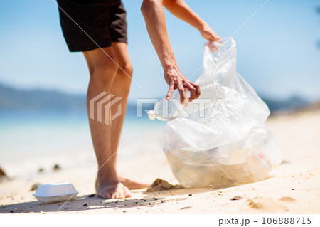 Plastic garbage. Sea pollution. Beach clean up. 106888715