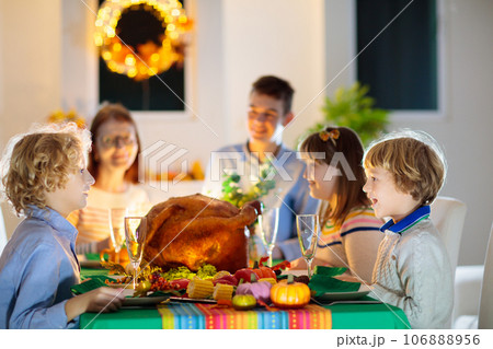 Thanksgiving family dinner. Roasted turkey meal. Thanksgiving family dinner. Roasted turkey meal. 106888956