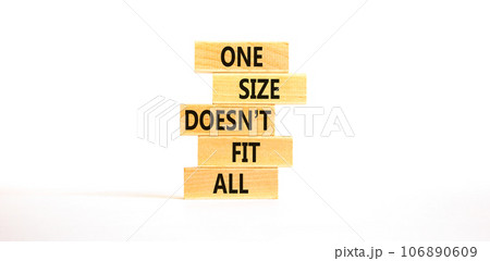 One size does not fit all symbol. Concept words One size does not fit all on wooden blocks. Beautiful white table white background. One size does not fit all business concept. Copy space. One size does not fit all symbol. Concept words One size does not fit all on wooden blocks. Beautiful white table white background. One size does not fit all business concept. Copy space. 106890609