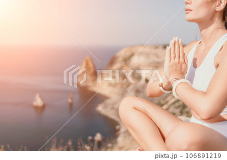 Fitness woman sea. Outdoor workout on yoga mat roller in park near to ocean beach. Female fitness pilates yoga routine concept. Healthy lifestyle. Happy fit woman exercising with rubber band in park. 106891219