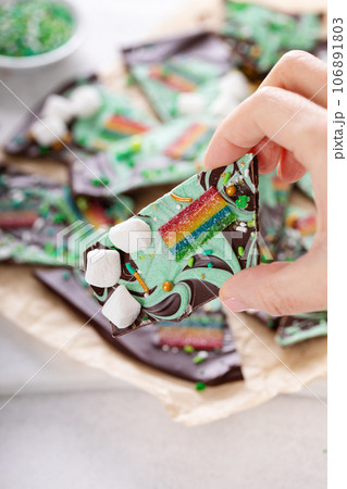 St Patricks day chocolate bark with sprinkles and rainbows St Patricks day chocolate bark with sprinkles and rainbows 106891803