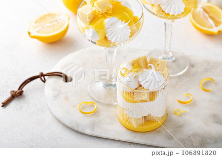 Lemon parfait with pound cake, lemon curd, whipped cream and meringue 106891820