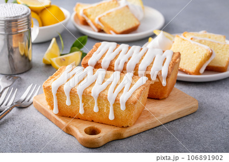 Lemon pound cake frreshly baked with sugar glaze Lemon pound cake frreshly baked with sugar glaze 106891902