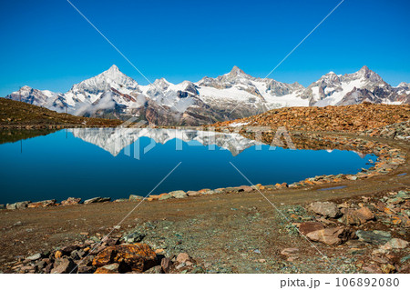 Riffelsee lake and Matterhorn, Switzerland 106892080