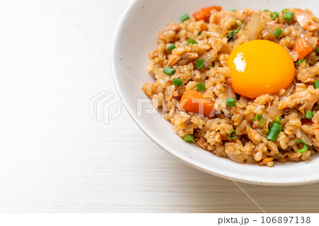 salmon fried rice with pickled egg on top 106897138