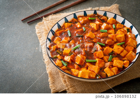 Mapo Tofu - The traditional Sichuan dish of silken tofu and ground beef, packed with mala flavor from chili oil and Sichuan peppercorns. 106898132
