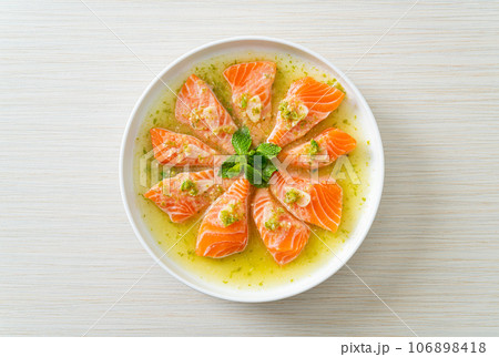 Spicy Salmon in Seafood Salad Sauce Spicy Salmon in Seafood Salad Sauce 106898418