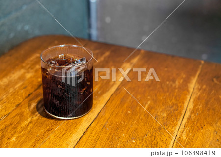 ice cola glass on table ice cola glass on table 106898419