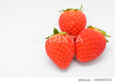 beautiful three fresh red strawberry isolated on white background 106899781