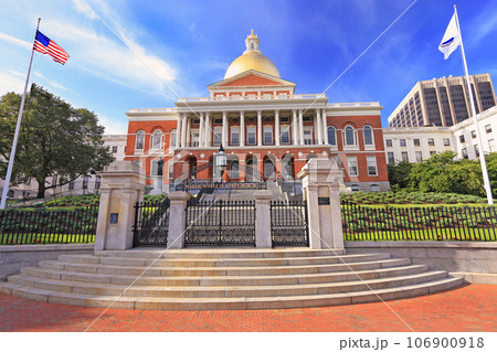 Massachusetts State House and State Library. Imposing red building with white columns and golden dome. Massachusetts State House and State Library. Imposing red building with white columns and golden dome. 106900918
