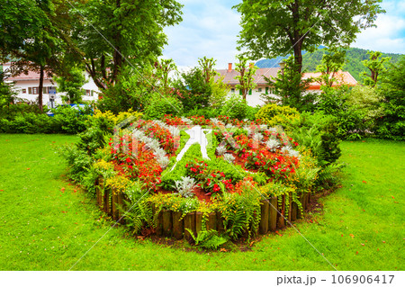 Flower garden park in Mittenwald, Germany Flower garden park in Mittenwald, Germany 106906417