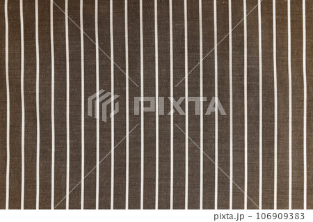 Brown white striped fabric texture background with copy space 106909383